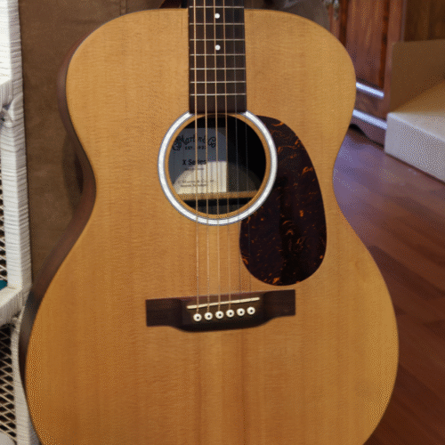 Acoustic guitar ready for a beginner guitar lesson at Upnotes Music in Kelowna, BC.